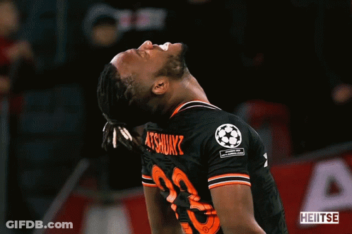 Man In Blue Shirt With Bundesliga Logo GIF