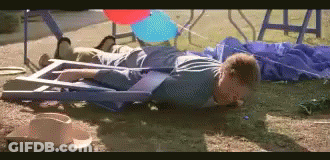 Man In Blue Shirt With Crutch And Cowboy Hat GIF