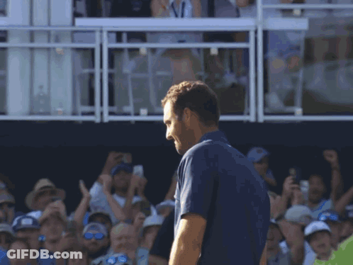 Man In Blue Shirt With Flea GIF