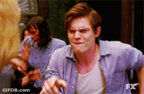 Man In Blue Shirt With FX On Bottom GIF