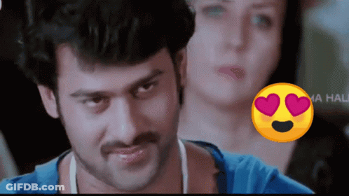 Man In Blue Shirt With Heart Smiley Face GIF