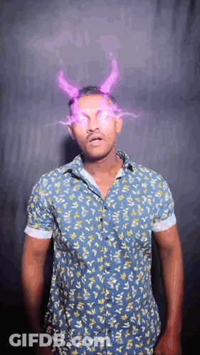 Man In Blue Shirt With Horns GIF