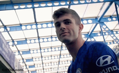 Man In Blue Shirt With Hyundai On Sleeve GIF