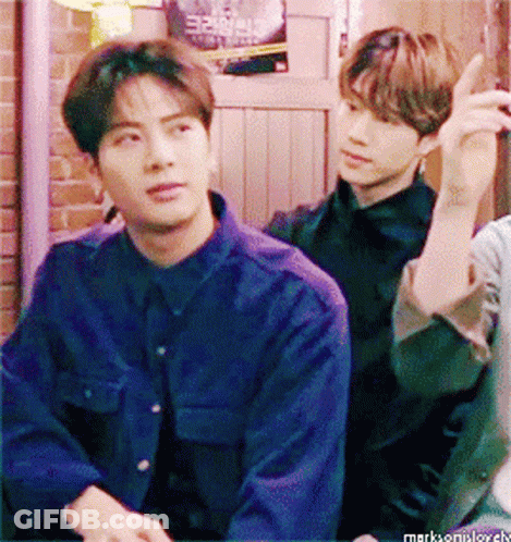Man In Blue Shirt With I Love You Wrist Tattoo GIF