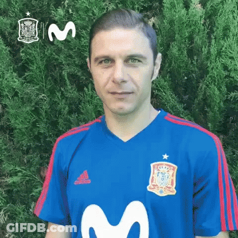 Man In Blue Shirt With Letter M GIF