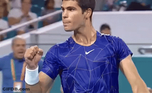 Man In Blue Shirt With Nike Logo GIF