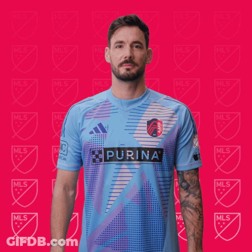 Man In Blue Shirt With Purina GIF