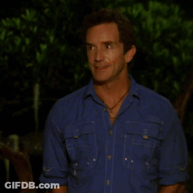 Man In Blue Shirt With Red Spot On Cheek GIF