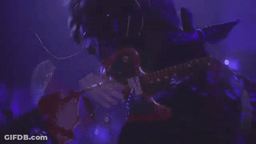 Man In Blue Shirt With Reebok Necklace GIF