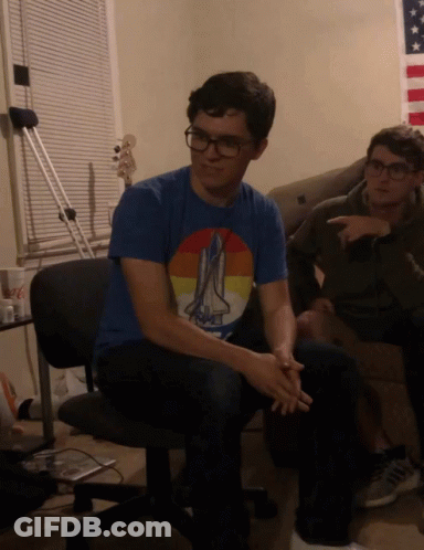 Man In Blue Shirt With Space Shuttle GIF