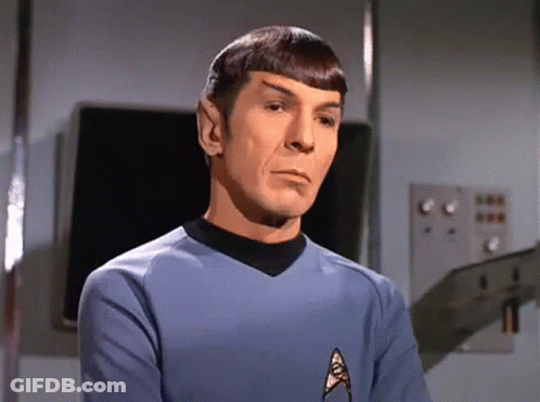 Man In Blue Shirt With Star Trek Logo GIF
