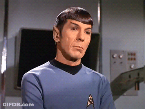 Man In Blue Shirt With Star Trek Logo GIF