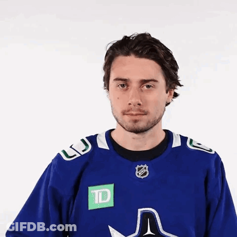 Man In Blue Shirt With TD Logo GIF