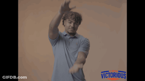Man In Blue Shirt With Victorious GIF