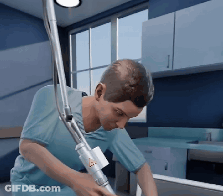 Man In Blue Shirt Working On Machine With Warning Sign GIF