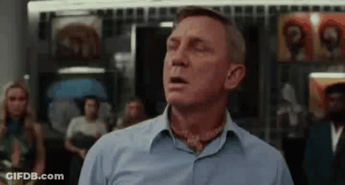 Man In Blue Shirt Yawning GIF