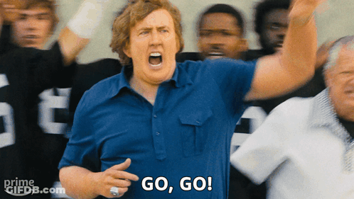 Man In Blue Shirt Yelling Go Go GIF