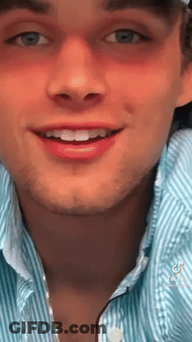 Man In Blue Striped Shirt And Hat GIF