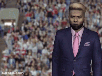 Man In Blue Suit And Pink Tie In Front Of Crowd GIF