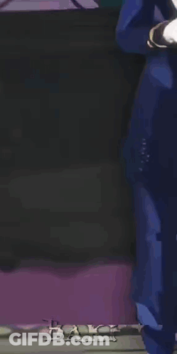 Man In Blue Suit And Purple Shoes Hand On Chin GIF