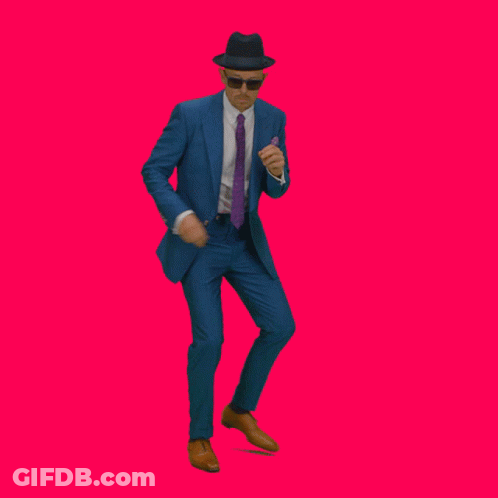 Man In Blue Suit And Purple Tie Pointing At Jacket GIF