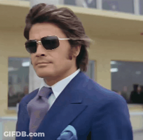 Man In Blue Suit And Sunglasses GIF