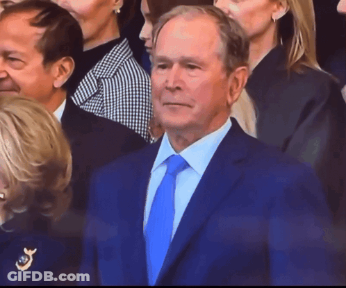 Man In Blue Suit And Tie GIF
