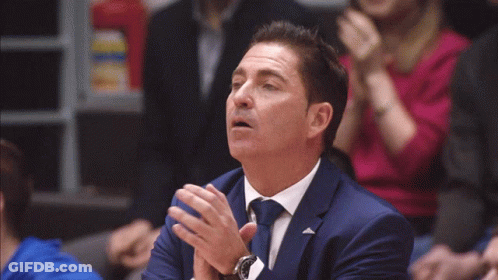 Man In Blue Suit And Tie Giving Thumbs Up GIF