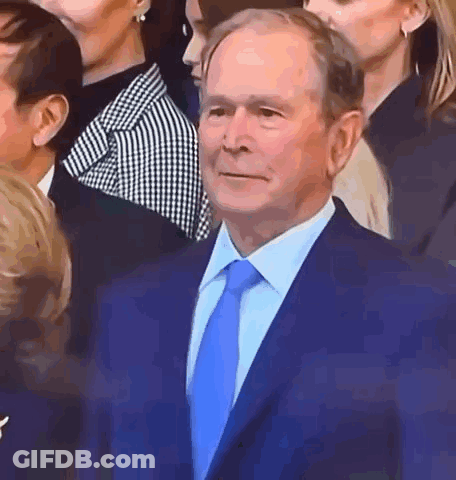 Man In Blue Suit And Tie GIF