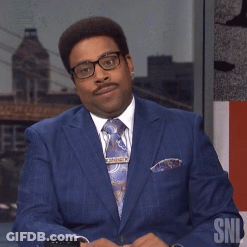 Man In Blue Suit And Tie With SNL GIF