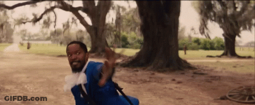 Man In Blue Suit And White Bow Tie GIF