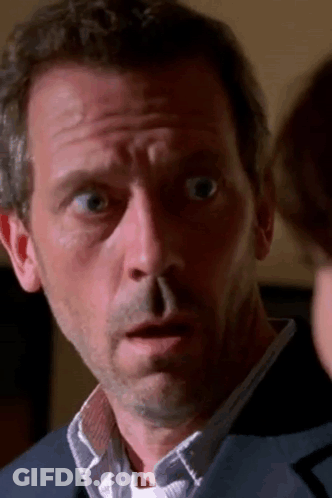 Man In Blue Suit And White Shirt Surprised GIF