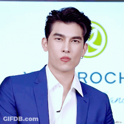 Man In Blue Suit And White Shirt With Roch Sign GIF