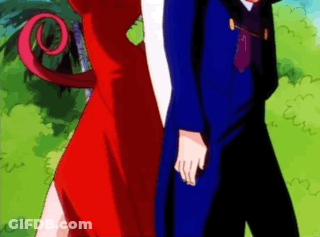 Man In Blue Suit And Woman In Red Dress GIF
