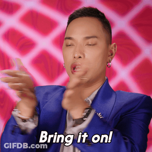Man In Blue Suit Clapping Saying Bring It On GIF