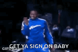 Man In Blue Suit Dancing Get Ya Sign On Baby GIF