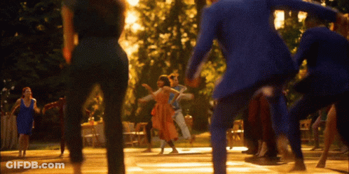Man In Blue Suit Dancing GIF