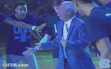 Man In Blue Suit Dancing On Stage With N GIF
