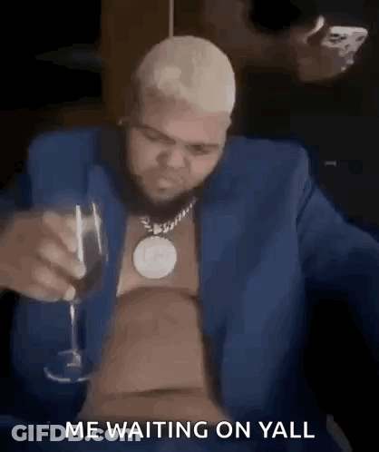 Man In Blue Suit Drinking Wine GIF