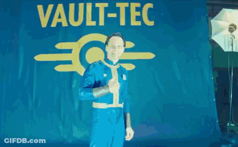Man In Blue Suit Giving Thumbs Up Saying Vault Lc GIF