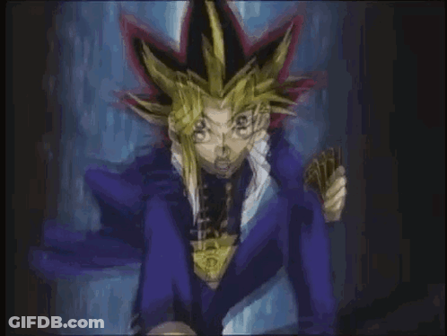 Man In Blue Suit Holding Card GIF