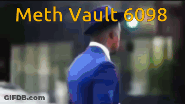Man In Blue Suit In Front Of Meth Vault 6098 Sign GIF