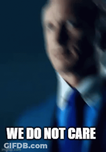 Man In Blue Suit Making Funny Face GIF