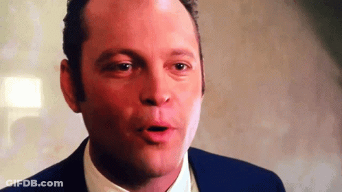 Man In Blue Suit Making Funny Face GIF