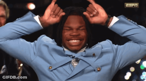 Man In Blue Suit Making Funny Face With ESPN Logo GIF