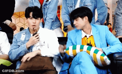 Man In Blue Suit Next To Man In White Shirt GIF
