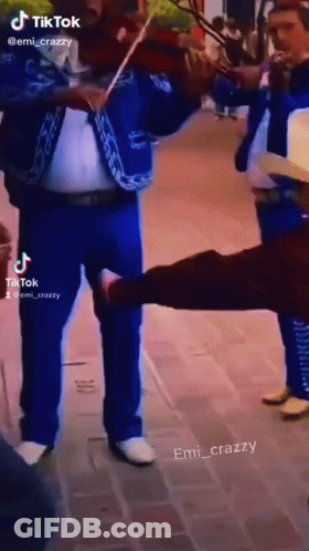 Man In Blue Suit Playing Violin GIF