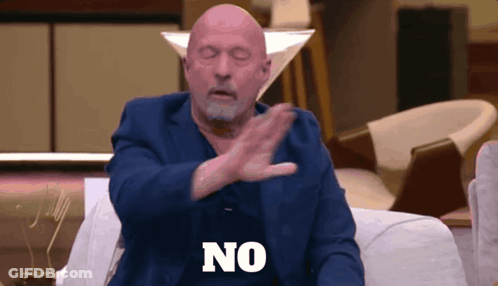 Man In Blue Suit Saying No With Hands GIF