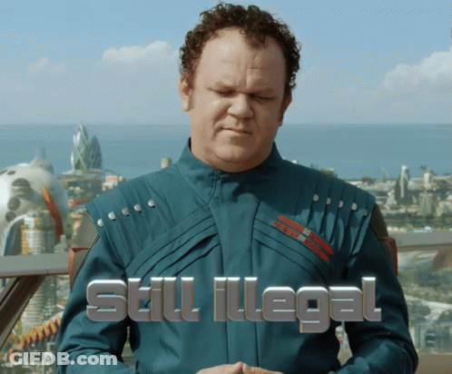 Man In Blue Suit Saying Still Illegal GIF