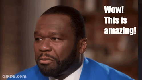 Man In Blue Suit Smiling Wow This Is Amazing GIF